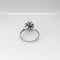 Bague Bague Marguerite en or blanc et diamants 58 Facettes 21248