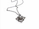 Collier Collier Fleur Or noir Diamant 58 Facettes 578701RV