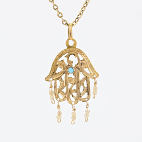 Pendentif Pendentif main de Fatma or perles et pierre turquoise 58 Facettes 18-008A