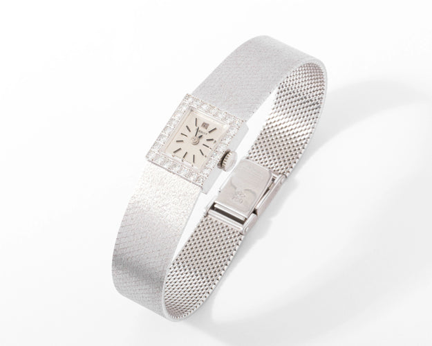 Montre Montre Tissot or gris et diamant 58 Facettes 0