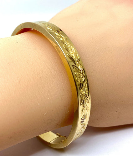 Bracelet Bracelet jonc ouvrant ciselé de roses et de feuilles 58 Facettes