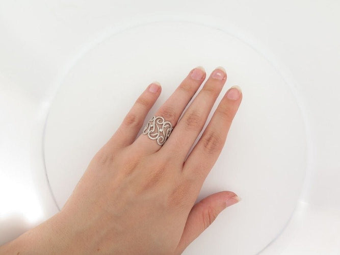 Bague 50 bague DJULA dentelles vagues 50 en or blanc 18k & diamants 58 Facettes 242626