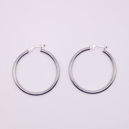 Boucles d'oreilles Créoles or blanc 18 carats 58 Facettes