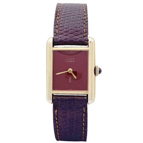 Montre Montre Cartier "Tank Must" argent plaqué or, cadran laqué rouge. 58 Facettes 33540