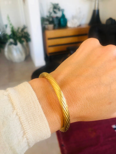 Bracelet Bracelet jonc fermé torsadé or jaune 58 Facettes