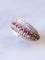 Bague Bague bandeau vintage en or gris, rubis, et diamants 58 Facettes