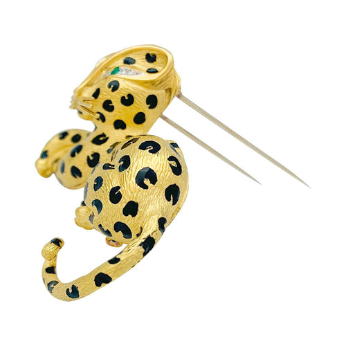 Broche Broche Fred "Léopard" en or jaune, diamants, émail et émeraudes. 58 Facettes 32381