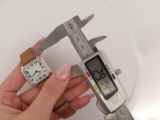 Montre vintage montre BAUME ET MERCIER lady 38260 27 mm quartz or blanc 18k 58 Facettes 252218