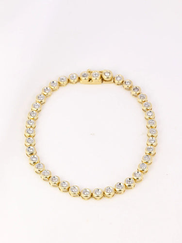 Bracelet Bracelet tennis vintage or jaune et diamants en serti clos 58 Facettes J92