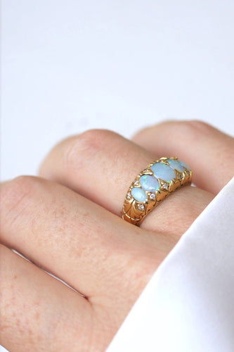 Bague Bague jarretière opales et diamants 58 Facettes