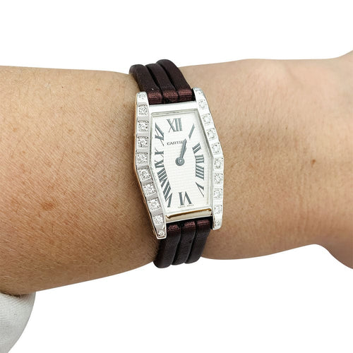 Montre Montre Cartier "Lanière" en or blanc et diamants, bracelet cuir. 58 Facettes 30252