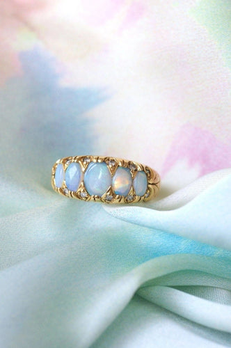 Bague Bague jarretière opales et diamants 58 Facettes