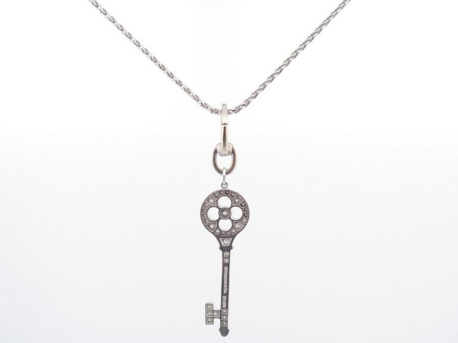 Collier collier pendentif TIFFANY & CO cle rosace platine diamants 58 Facettes 248507
