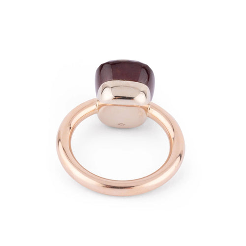 Bague  de la maison Pomellato modèle Nudo en grenat 58 Facettes 1