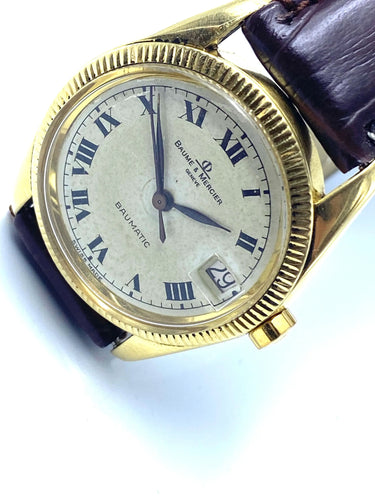 Montre BAUME ET MERCIER - Boitier Baumatic en or 58 Facettes