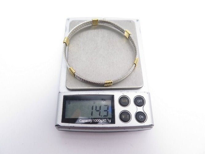 Bracelet vintage bracelet FRED force 10 en or jaune 18k et acier 58 Facettes 242577