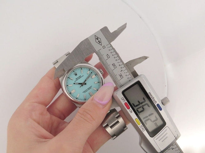 Montre montre ROLEX 126000 oyster perpetual tiffany 36 mm automatique acier 58 Facettes 254066