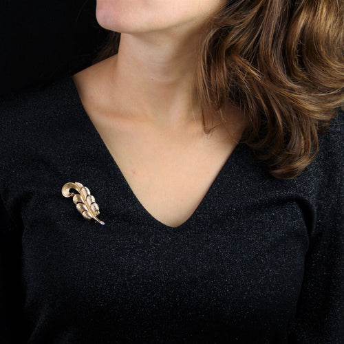 Broche Broche vintage plume en or 58 Facettes 22-417