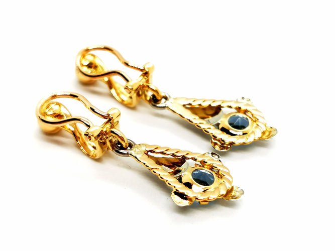 Boucles d'oreilles Boucles d'oreilles Clip Or jaune Topaze 58 Facettes 1468380CN