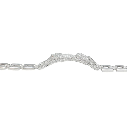 Bracelet Bracelet Cartier "Panthère de Cartier" en or blanc, diamants, émeraude et onyx. 58 Facettes 31544