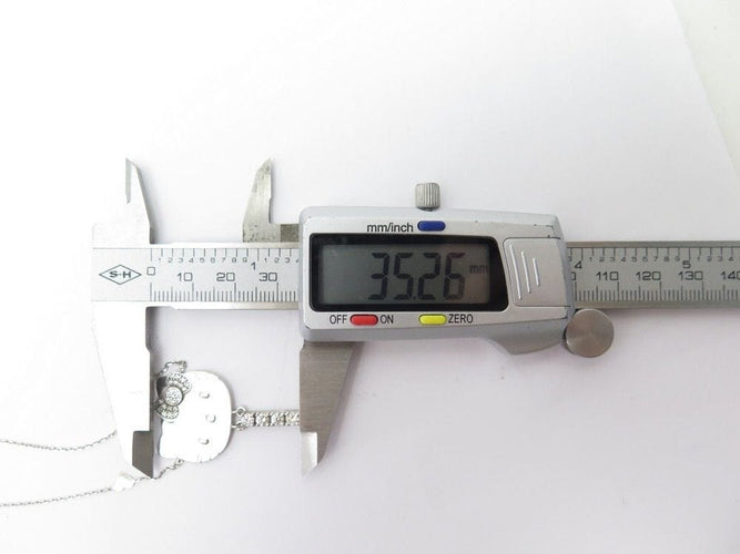 Collier collier VICTORIA CASAL pendentif hello kitty en or blanc 18k diamants 58 Facettes 253448