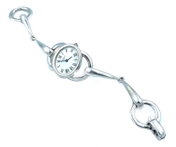 Montre CHOPARD. Montre vintage argent et mouvement mécanique 58 Facettes