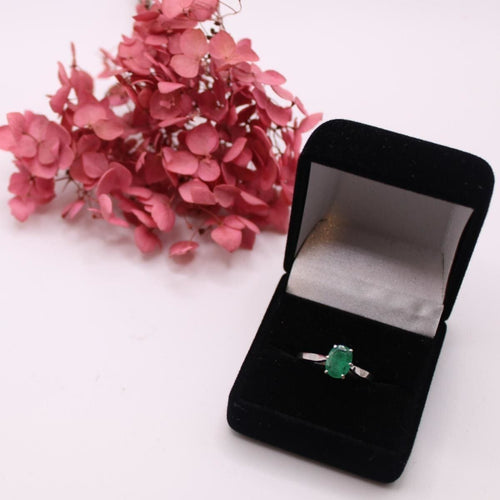 Bague Solitaire or blanc Emeraude ovale 58 Facettes