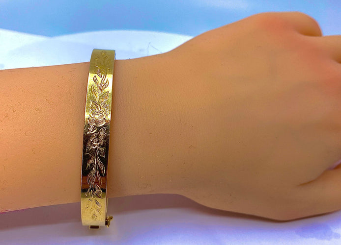 Bracelet Bracelet jonc ouvrant ciselé de roses et de feuilles 58 Facettes