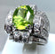 Bague Bague Art Déco Platine diamants et péridot 58 Facettes