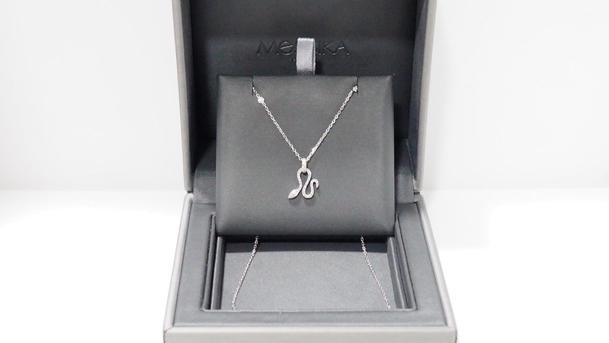 Collier Collier Messika "snake" en or blanc et diamants 58 Facettes 32005