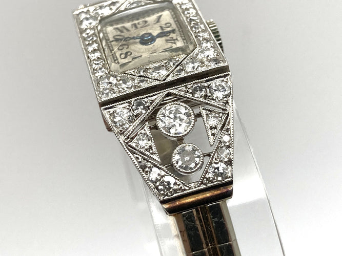 Montre Montre Art Déco platine & or blanc, diamants 2.44 cts 58 Facettes 07/07 - 16