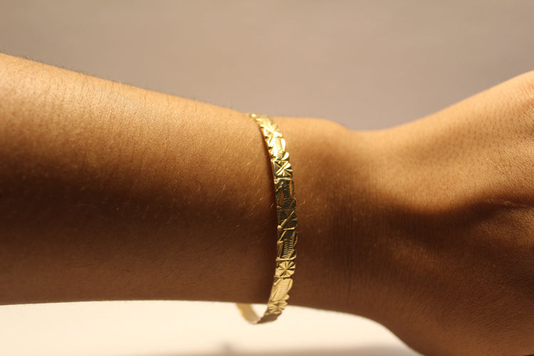 Bracelet Bracelet plat Or jaune gravé 58 Facettes 11312