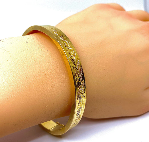 Bracelet Bracelet jonc ouvrant ciselé de roses et de feuilles 58 Facettes