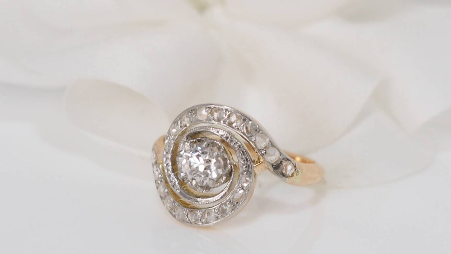 Bague Bague tourbillon en or bicolore et diamants 58 Facettes 31338