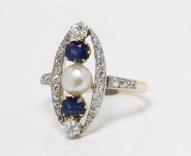 Bague 55 Bague marquise Belle Epoque, diamant, saphirs et perle fine 58 Facettes