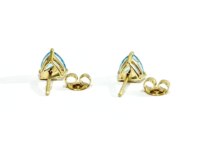 Boucles d'oreilles Paire de boucles d'oreilles or et topaze bleue 58 Facettes