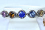 Bracelet Bracelet jonc en or 18 carats, multipierres : saphir, topazes, citrine. Epoque Napoléon III. 58 Facettes AB272