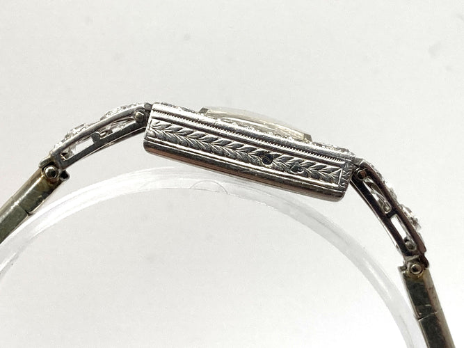 Montre Montre Art Déco platine & or blanc, diamants 2.44 cts 58 Facettes 07/07 - 16