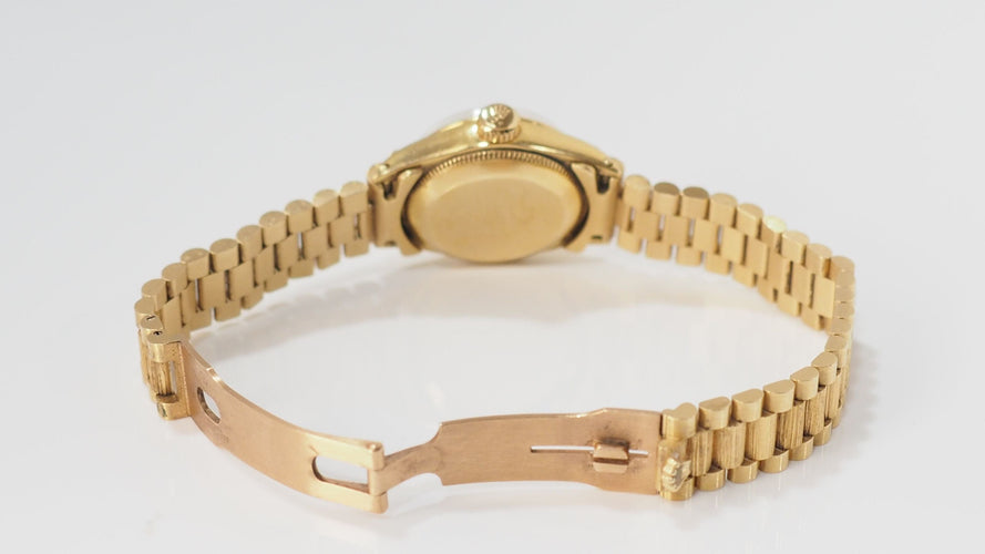 Montre 14 Montre Rolex Lady Oyster Perpetual en or jaune 18kt 58 Facettes 31934