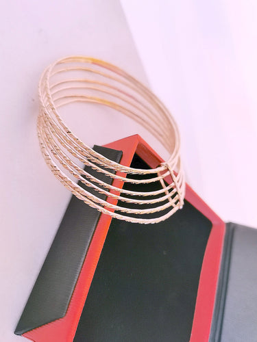 Bracelet Bracelet Semainier Joncs ciselés Or Rose 58 Facettes AA 1477