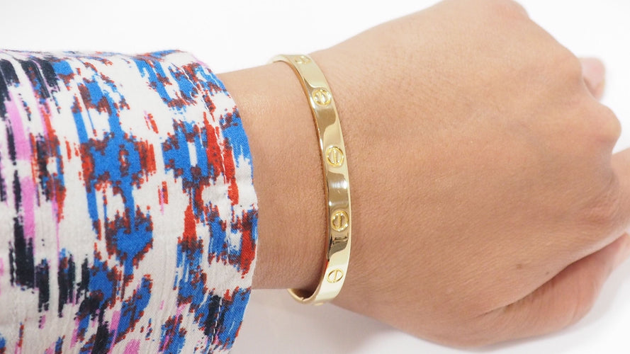 Bracelet 18 Bracelet Cartier Love "vintage" en or jaune 58 Facettes 32199