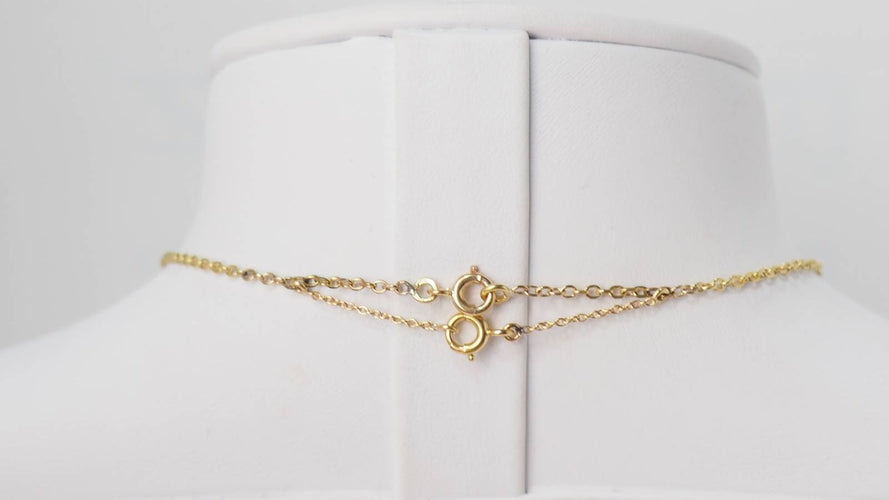 Collier Collier draperie ancien en or jaune 58 Facettes 31302