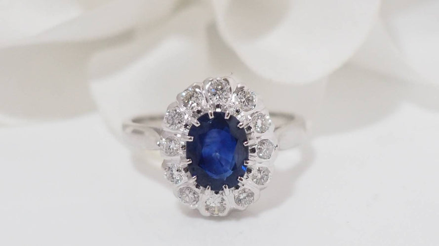 Bague 52 Bague marguerite en or blanc, saphir et diamants 58 Facettes 31169