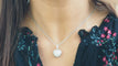 Collier Collier pendentif cœur en or blanc & diamants 58 Facettes 29969
