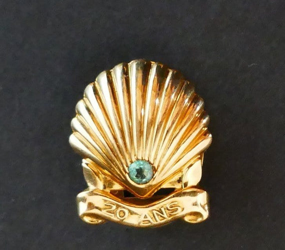 Broche Cartier - Boutonnière en Or jaune, émeraude 58 Facettes