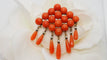 Broche Broche ajourée Napoléon III perles corail et émail noir 58 Facettes 30349