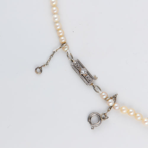 Collier Collier ancien de perles de cultures blanches, fermoir diamants 58 Facettes