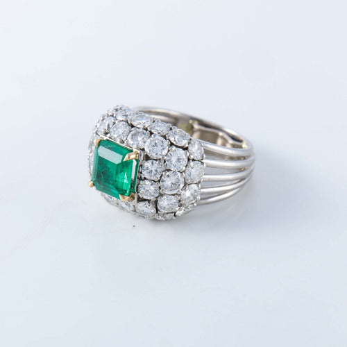 Bague Bague en platine, émeraude et diamants 58 Facettes