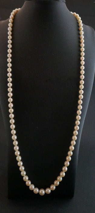 Collier Collier de perle, émeraude, diamants 58 Facettes 1084383