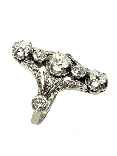 Bague 55 Bague Art-Deco, or, platine et diamants 58 Facettes